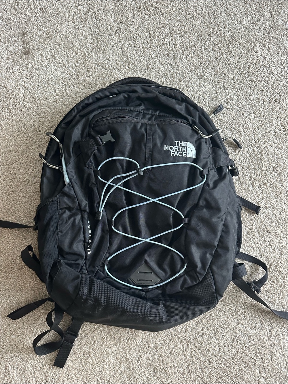 The North Face Black Backpack with Light Blue Cord Bungee